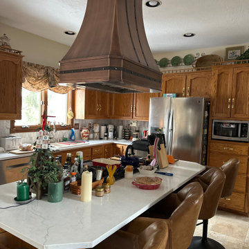 Luxury Custom Copper Island Range Hood with Riveted Accents