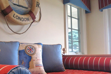 Example of a small beach style guest bedroom design in New York with beige walls and no fireplace