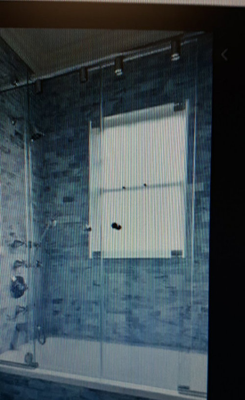 Should I tile up to the ceiling above vanity?