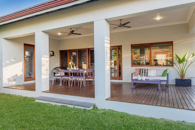 This is an example of a mid-sized contemporary backyard deck in Perth with an outdoor kitchen and a pergola.
