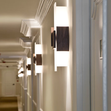 Acuo LED Wall Sconces lining Hotel Hallway