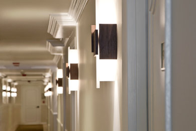 Acuo LED Wall Sconces lining Hotel Hallway