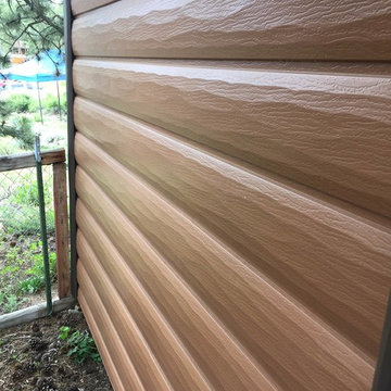 Steel Log Siding Install in Red Feather, CO