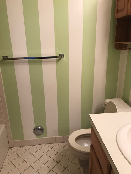 Renovating two bathrooms with almond tub and toilets.