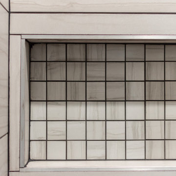 Tiled shower niche with charcoal grout