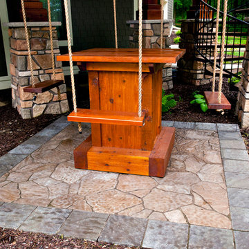 Finished table with swinging chairs