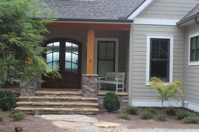 Large craftsman gray two-story mixed siding house exterior idea in Atlanta with a shingle roof