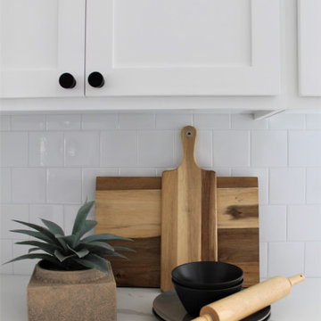 Wooden Cutting Boards, Black Stoneware, Plant and Rolling Pin