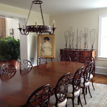 faux mahogany painted dining table with faux inlay detail on legs