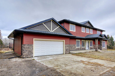 Inspiration for a cottage exterior home remodel in Edmonton