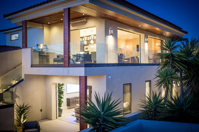 Example of a tuscan home design design in San Diego