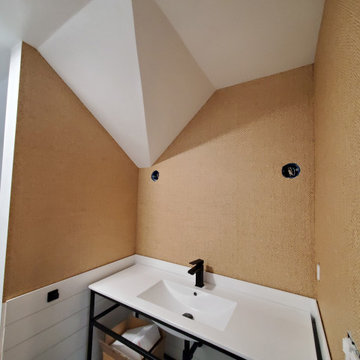 Wallpapering in a bathroom with grasscloth material