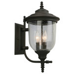 EGLO - Pinedale Outdoor Wall Light - Bring a charming look to your exterior with the Pinedale Outdoor Wall Lantern Light by Eglo.This uniquely shaped light is enlivened by its clear seedy glass shade that gives it a sense of whimsy and graceful style welcoming your guests to your home.