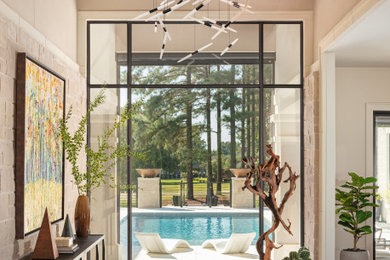 Example of a transitional porcelain tile, beige floor and wood ceiling entryway design in Little Rock