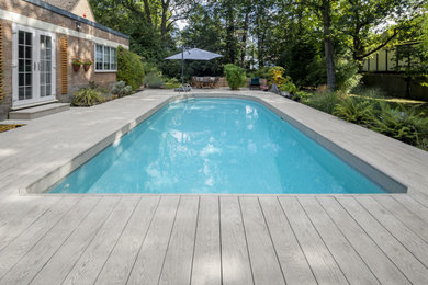 Composite decking installation for swimming pool area