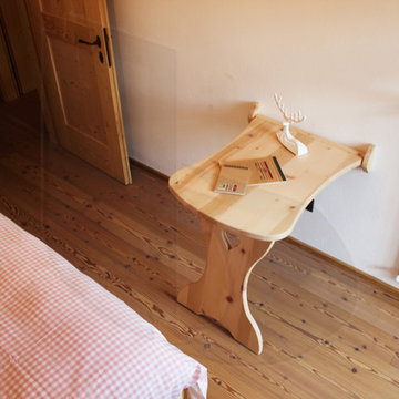Camera da letto in legno di Cirmolo