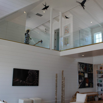 Glass Balustrade with Aluminum Base Rail Finished with Satin Brass Cladding