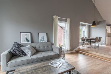 Minimalist living room photo in Montreal