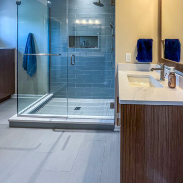 Contemporary Primary Bath with Rich Walnut Veneer Cabinets