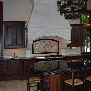 Traditional Carved Stone Range Hood with Grapes and Vine Detail
