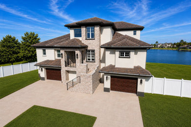 Large beach style exterior home photo in Tampa