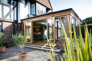 Inspiration for a large classic conservatory in Kent with a skylight.
