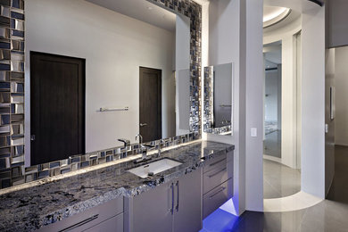Minimalist master blue tile and glass tile bathroom photo in Phoenix with gray cabinets, white walls, marble countertops and gray countertops