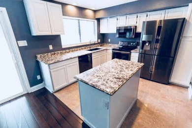 Example of a transitional kitchen design in Denver