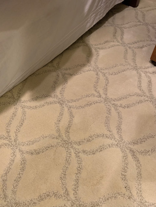 Area rug over carpeting