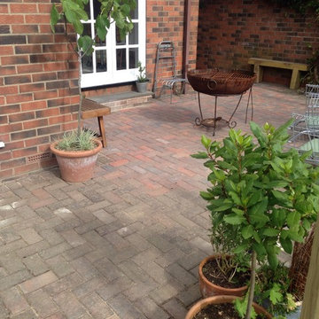 Block paving, wire rope contemporary fencing