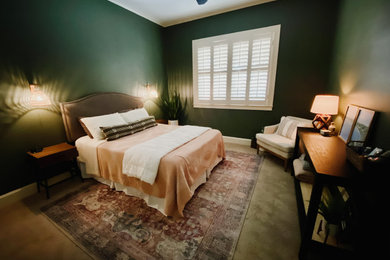 Example of a mid-sized transitional guest carpeted and beige floor bedroom design in Dallas with green walls