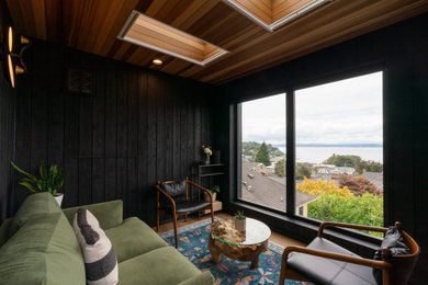 Sunroom - small sunroom idea in Seattle with a skylight