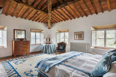 Inspiration for a large traditional master bedroom in Florence.