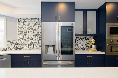 Example of a large l-shaped ceramic tile and gray floor eat-in kitchen design in Toronto with a farmhouse sink, flat-panel cabinets, blue cabinets, quartz countertops, multicolored backsplash, ceramic backsplash, colored appliances, an island and white countertops