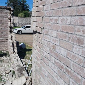 Before: Collapsed Exterior Brick Wall