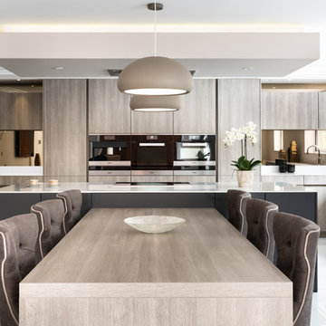 Contemporary Kitchen with a T Shape Island and Dining