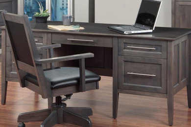 Large arts and crafts freestanding desk dark wood floor and brown floor study room photo in Edmonton with white walls