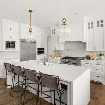 Statement White Kitchen with Oversized Island