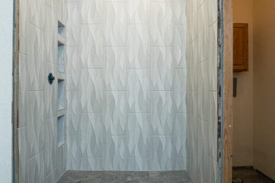 Example of a mid-sized minimalist master white tile and porcelain tile ceramic tile and gray floor open shower design in Other with a niche