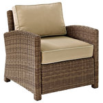 Crosley - Bradenton Outdoor Wicker Arm Chair With Sand Cushions - This finely crafted all-weather armchair makes a sophisticated addition to any outdoor space. Boasting a durable steel frame, this chair features an intricately woven wicker casing that exudes an elegant country charm. Complete with moisture-resistant cushions with weather-resistant cushion covers, the sand Bradenton Outdoor Wicker Arm Chair is super easy to assemble and maintain.