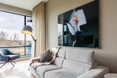 Living room - large contemporary formal and loft-style light wood floor and brown floor living room idea in Montreal with beige walls, no fireplace and no tv