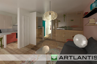 Imagen de sala de estar abierta mediterránea sin chimenea y televisor con paredes rosas, suelo laminado y suelo marrón