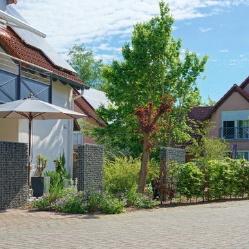 Auffrischung eines Hausgartens mit 2 Terrassen