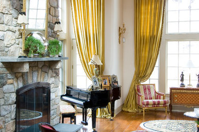 Inspiration for a huge timeless formal and open concept medium tone wood floor living room remodel in Philadelphia with beige walls, a standard fireplace, a stone fireplace and no tv