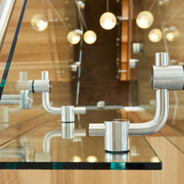 white oak mono stringer with stainless steel hand rail