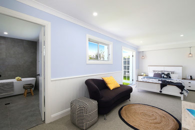 Inspiration for a beach style bedroom in Sydney.