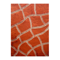 Dimension Shaggy Polyester 5'x7'3" Machine Woven Area Rug in Orange and Beige
