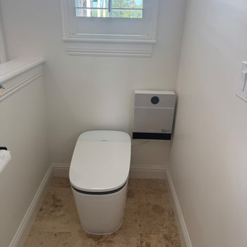Curd-less walk-in shower; heated floors in bathroom + shower+bench LED