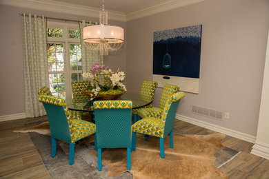 Dining room - transitional porcelain tile dining room idea in Other with gray walls