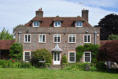 Photo of a traditional exterior in Surrey.